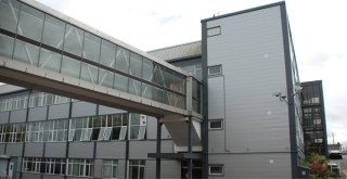 Steel cladding on a refurbished industrial unit with the addition of a steel built extension